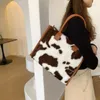 Bolsas de noche Moda Top-Handle Retro Vaca Leopardo Estampado de peluche Diseño Otoño Invierno Bolsa de hombro Gran capacidad Bolsos de mujer Totes