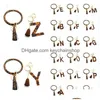 Nyckelringar akryl bokstäver armbands ring Tassel Leopard cirkel Bangle Keychains Chain Leather Keychain Armband för kvinnor Drop Leverans DHRL4
