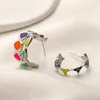 Diseñador Chicas coloridas Pendientes de esmalte Charm Marca Carta Regalos chapados en oro Pendientes colgantes Aleación Sin desvanecimiento Joyería de alta calidad Pendientes de lujo