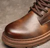 Piattaforma di avvio da uomo della caviglia Piattaforma di avvio vintage marrone casual martin booties designer allacciata su stivali in gomma a basso tacco