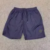 Shorts de créateurs pour hommes, badges classiques, shorts de plage pour hommes, pantalons légers et fins à séchage rapide, shorts de sport 3/4, shorts de course décontractés en plein air