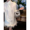 Partykleider Frühlingskleidung Einzigartiger schicker Rock Französischer kleiner Duft Zartes weißes Straußenhaar-Hemdkleid weiblich