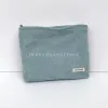 Simples cor sólida veludo saco de cosméticos feminino doce moda grande capacidade senhoras embreagem casual portátil sacos de armazenamento feminino