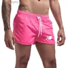 Ensembles actifs 2023 été nouvelle plage couleur bonbon short respirant à séchage rapide pour hommes et femmes costume de plage de luxe Fitness et course S-3XLL230927