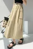 ベルトのしわのあるハイウエストハーフボディスカートの女性夏の韓国のルーズワークポケットファッションカジュアル長いスカート