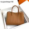 Designer Garden Party Sacs 2023 Nouveau Hhome Cuir Togo Calfskin Commuter Business Sac à main Femme Grande capacité Fourre-tout ont logo DPC9