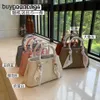 Designer Garden Party Bags Net Red Bag Female Classic Solid Color 25cm Head Layer Cowhide Single Shoulder Cross Body Portable Bun Mother Have Logo E2ur