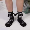 Мужские носки Рождественские носки с магнитной присоской «Рука об руку» Черно-белые унисекс Длинные носки для девочек Harajuku Симпатичная пара Хлопковые носки 230927