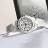 Excellentes montres en céramique noire 38mm édition limitée montre-bracelet à quartz marqueurs de diamant calibre cadran noir boîte papiers cadran blanc wo291j