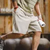 Męskie szorty amerykański w stylu wagi ciężkiej z koralikami warstwa powietrza z dzianiny haft haftowy koszykówka pięciominutowe spodnie sweter
