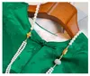 ملابس عرقية متقدمة من الحرير الحرير Jacquard معطف المرأة الخريف الأنيقة النمط الصيني الرجع