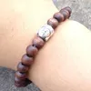 SN0408 Le più nuove linee di gioielli di design su braccialetti di perline di legno Bracciale con testa di buddha buddista gioielli in legno per uomo2446