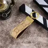 Nyckelring för män Kvinnor Designer Brand Keychains Alloy Leather Letter Unisex Lanyard Gold Key Chain Car Keyring Classic Accessories