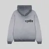 B Ciaga Paris Erkek Hoodies Baskı Boya Kapşonlu Sweatshirt Kadın Giysileri Şapka Pullover Sweater Turşu Su Eski Giysileri Kahverengi Sarı Gri Pembe Menswear Yapın