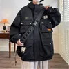 Trenchcoats voor heren Tooling-functie Multi-pocket jas Lente en herfst Koreaanse versie van zwarte capuchon Losse kleding Knappe jeugd