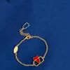 Bijoux de luxe pour femmes, bracelet en or, goutte d'huile exquise, cœur rouge, visage lisse, design creux, mode et créateur minimaliste, magnifique bracelet pour dame haut de gamme
