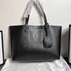 Sacs de shopping de créateurs de luxe Sac fourre-tout de grande capacité femme sac à bandoulière sacs à main en cuir de luxe bandoulière sac à provisions réversible sac maman sac de sport week-end