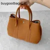 Designer Garden Party Bags Highquality Womens handväska med Cowhide Lychee -mönster stor kapacitet mångsidig och ädla pendling har logotyp N3S8