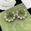 Luksusowe Pearl Ear Stud Designer Casual Golden Letters Studs Fashion Blask Diamond Truskawkowy biżuteria do damskich kolczyków CYG239276