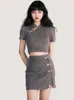 Sukienki robocze Sumne swobodne guziki retro dwuczęściowy zestaw kobiet pusta Midriff seksowna mini spódnica żeńska chińska styl szczupły garnitury 2023