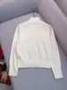 女性用セーター秋の冬冬のフランスの白いセータープルオーバー女性ファッションエレガントな真菌エッジタートルネックルーズニットトップレディース230927