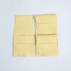 ギフトラップ100pcs黄色のマイクロファイバージュエリーパッケージ結婚式のための小さなバッグ8x8cmシックなキャンディーポーチビジネス卸売