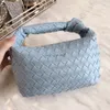 Bolsos de diseñador Bolso de dama Botteega Jodie Bolso de cuero Tejido Clásico Bolso anudado Mano que lleva la nube Nicho de moda Jodies rojos para mujer 26 cm