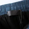 Spodenki męskie projektanci damskiej krótkie spodnie litera drukowana pasek pasa swobodne pięciopunktowe ubrania letnie ubranie plażowe bez pudełka