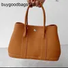 Designer Garden Party Bags Highquality Womens handväska med Cowhide Lychee -mönster stor kapacitet mångsidig och ädla pendling har logotyp N3S8