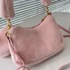 Designers de luxe femmes sac à bandoulière en métal triangulaire signe sacs chaîne en métal sac à main à la mode élégant paquet sous les bras