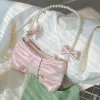 2023 Pearl Bowknot Underarm Bag For Women Pink White Pearlescent Shoulder Bag Ins Designer Gentle Handbag Crossbody Storage Påsar