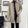 Trench da uomo stile coreano autunno cappotto maschile streetwear giacca a vento trench da uomo tinta unita bottone grande casual lungo soprabito 2023