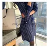 Grundläggande avslappnade klänningar Tingfly Women Winter Autumn Sticke Dress Houndstooth Button Decory Lady A Line Dress Knitwear Casual Mini Short Vestidos J230928