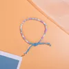 Braccialetti con ciondoli 12 pezzi Braccialetti dell'amicizia bohémien fatti a mano Braccialetti etnici colorati perline per donne Regalo per feste in spiaggia