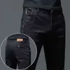 Cor sólida algodão preto cinza escuro calças de brim masculina clássico fino estiramento casual coreano moda juventude masculino denim calças