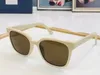 2023 Gafas de sol unisex de alta calidad, gafas cuadradas transparentes con montura media, manchas amarillas y negras, disponibles con caja
