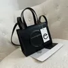 CT New Tote Bag Designer Bag Unisex 쇼핑 가방 모든 사람을위한 일상 가방 원래 부티크 패키지 럭셔리 백 지퍼 버튼 핸드백 클래식 클러치 qzzw123