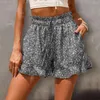 Kvinnors shorts Elastiska midjor fickor ruffle trim strand blommig tryck utdragande lösa gatakläder