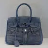 2024 Модные забавные джинсы карманные сумки для джинсовой сумочки дизайнерская сумка для плеча кросс -сайте сумка синяя сумка подмышки 230928