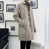 Trench da uomo stile coreano autunno cappotto maschile streetwear giacca a vento trench da uomo tinta unita bottone grande casual lungo soprabito 2023