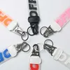 Anahtarlıklar Lanyards Jelly Offswhite Mektup Baskı Elektroklokasyon Orijinal Sırt Çantası W Kolye Erkekler ve Kadınlar İçin Çakan MW9Z AFXG