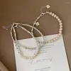 Bracelet de perles à brins pour femmes, Niche de luxe légère, délicat, réseau de sens senior, bijoux en perles rouges