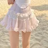 Jupes taille haute femmes jupe style japonais volants mini une ligne mode décontractée femme étudiante d'été