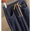 Kvinnors jeansstil av all-match högkvalitativ denim scythe byxor ritar rep nisch tunn hög midja mode mikro avsmalnande kvinnliga kläder