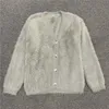 Totem stickad cardigan casual single breasted v-ring långärmad plysch stickad tröja jacka