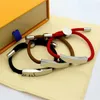 خطاب سوار عالي الجودة V LJIA Black Coffee Red Bracelet Bracelet Titanium Steel زوجين نماذج الأساور