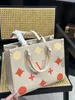 Lüks kadın çantalar moda alışveriş baskılı çanta tasarımcısı yüksek kaliteli tote çiçek kabartmalı pembe klasik omuz çantası36