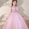 2023 rosa Country Flower Girl Abiti perle Fiocco posteriore rosa lucido Abito da ballo Gioiello Maniche a cappuccio bling Abito da spettacolo per ragazze con applicazioni in pizzo Abiti con fiocco grande Gonna tutu per feste