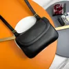 Designer Saddle Bag Women Shoulder bags Real cowhide bow clamshell wallet Stylish Luxury Alphabet Broadband crossbody bag Black and white