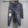 Herren Jeans Designer Herren Opai Neu personalisierte gebrochene Loch Bettler Patjeans für Jugendplatte Slim Fit Small Feet Hosen 4m90